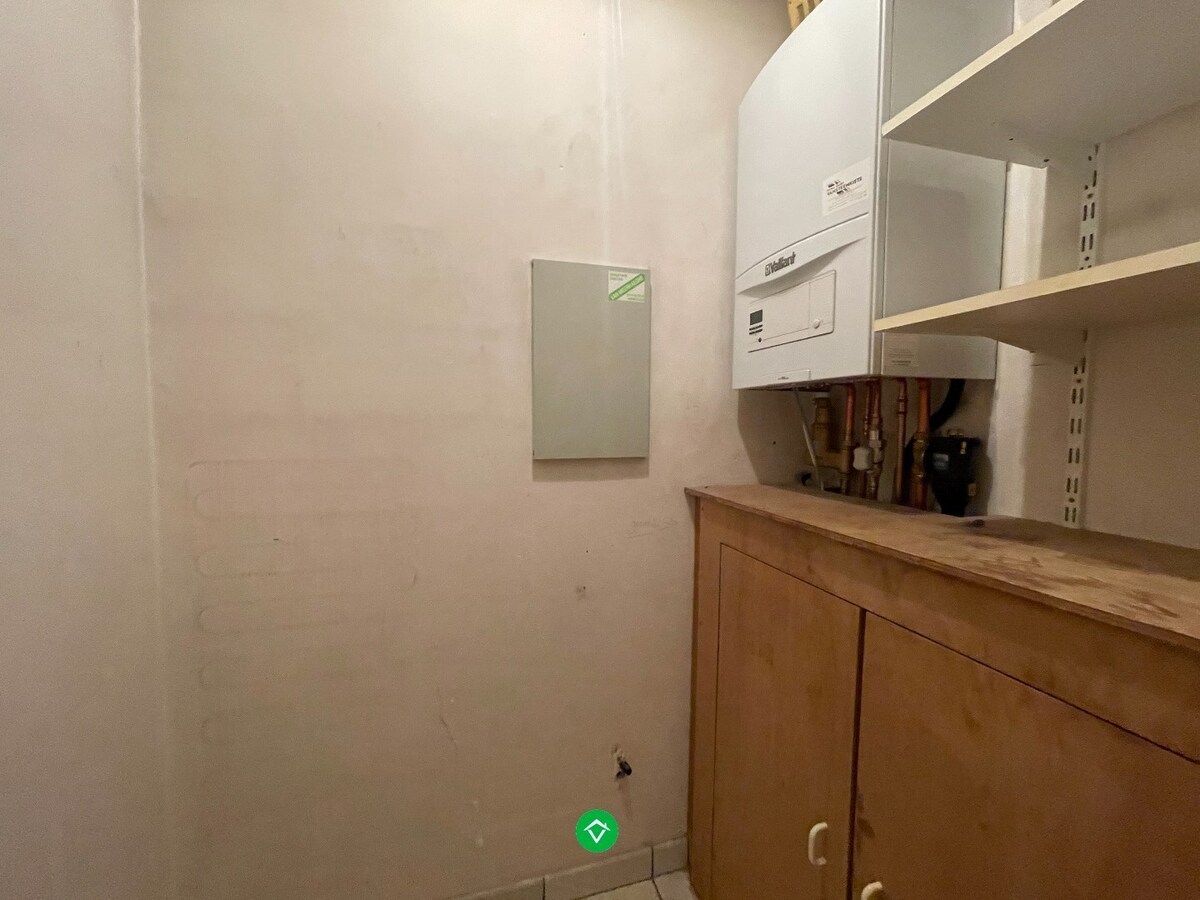 Groot appartement met 2 slaapkamers en garage in centrum Roeselare 
