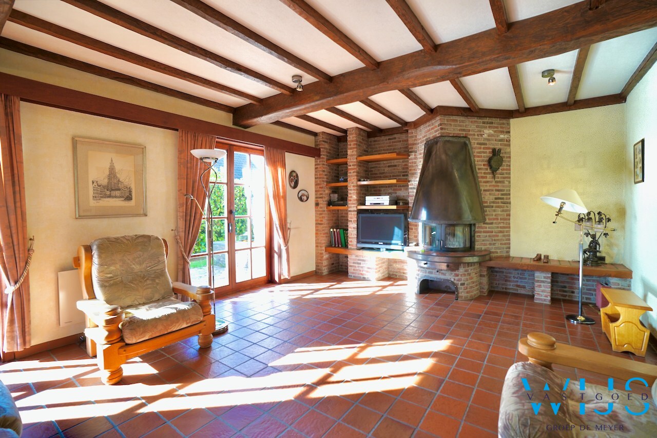 Fantastische open bebouwing met dubbele garage in gegeerde woonwijk te Evergem 