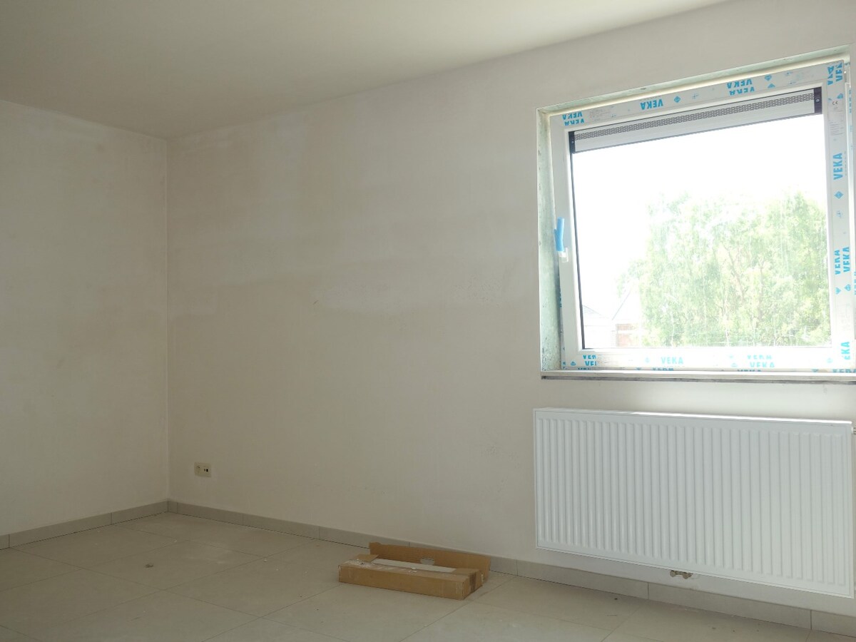 Construction moderne en plein coeur du village de Pecq ! 