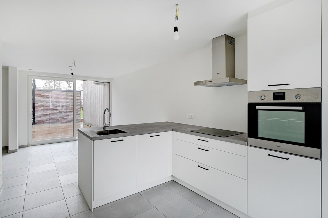 6% BTW MOGELIJK Gelijkvloers appartement met terras, lift en ondergrondse staanplaats 