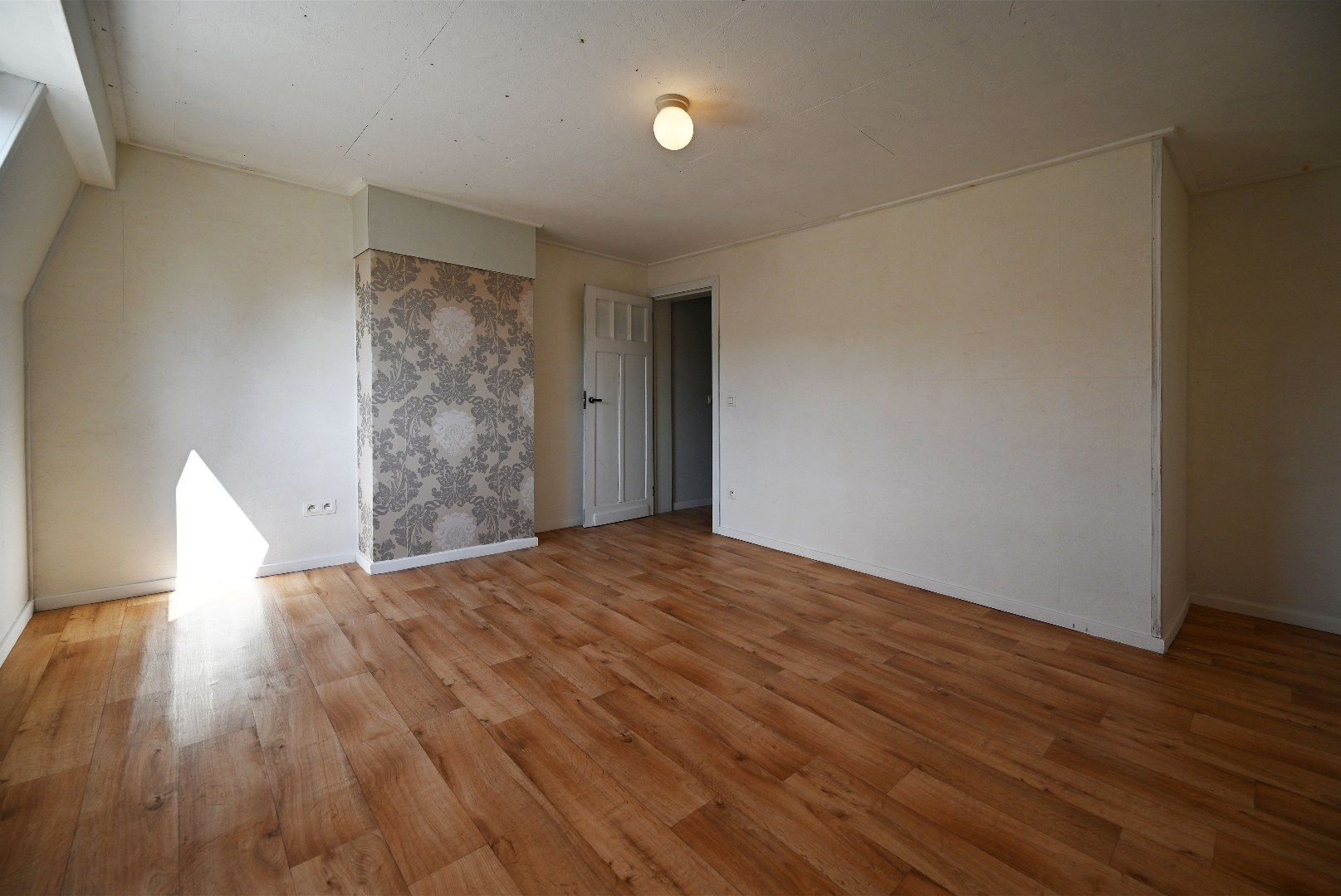 Rijwoning met 2 slaapkamers en tuintje te Eeklo 