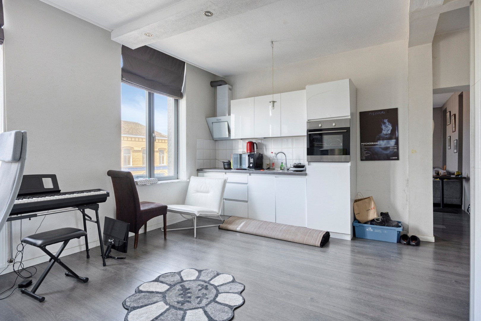 Handelshuis met horecazaak, 2 appartementen en luxueuze loft op toplocatie in Leopoldsburg 