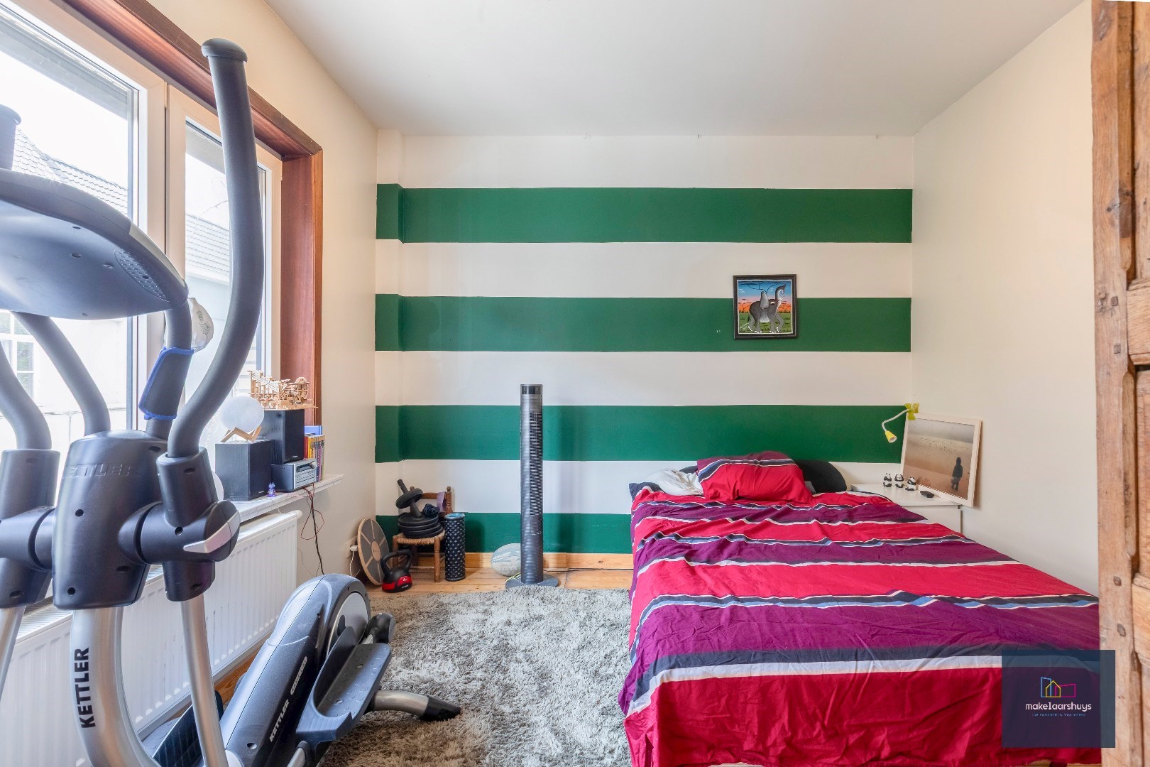 Instapklare woning met aangename tuin en garage 