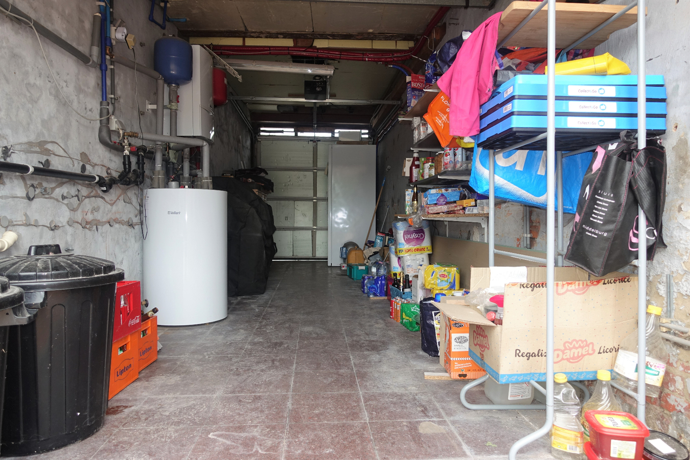 Half-open woning met grote tuin te Aartrijke 