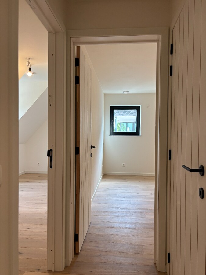 Nieuwbouwwoning met West-tuin in het centrum van Schilde 