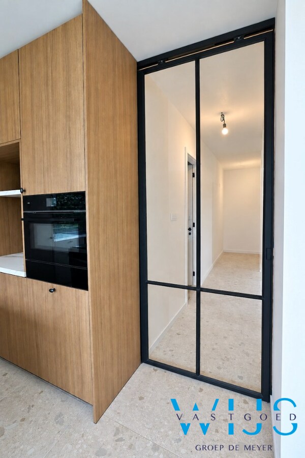 High-end gelijkvloers appartement met tuin te Lembeke ! 