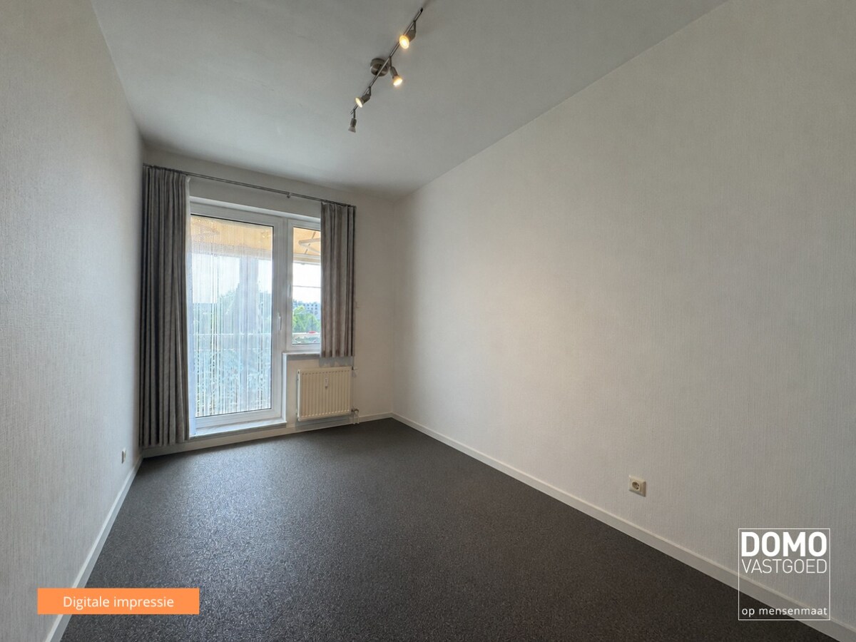 Ruim appartement van 121 m² met drie slaapkamers, twee terrassen en privatieve garagebox op toplocatie in Hasselt 