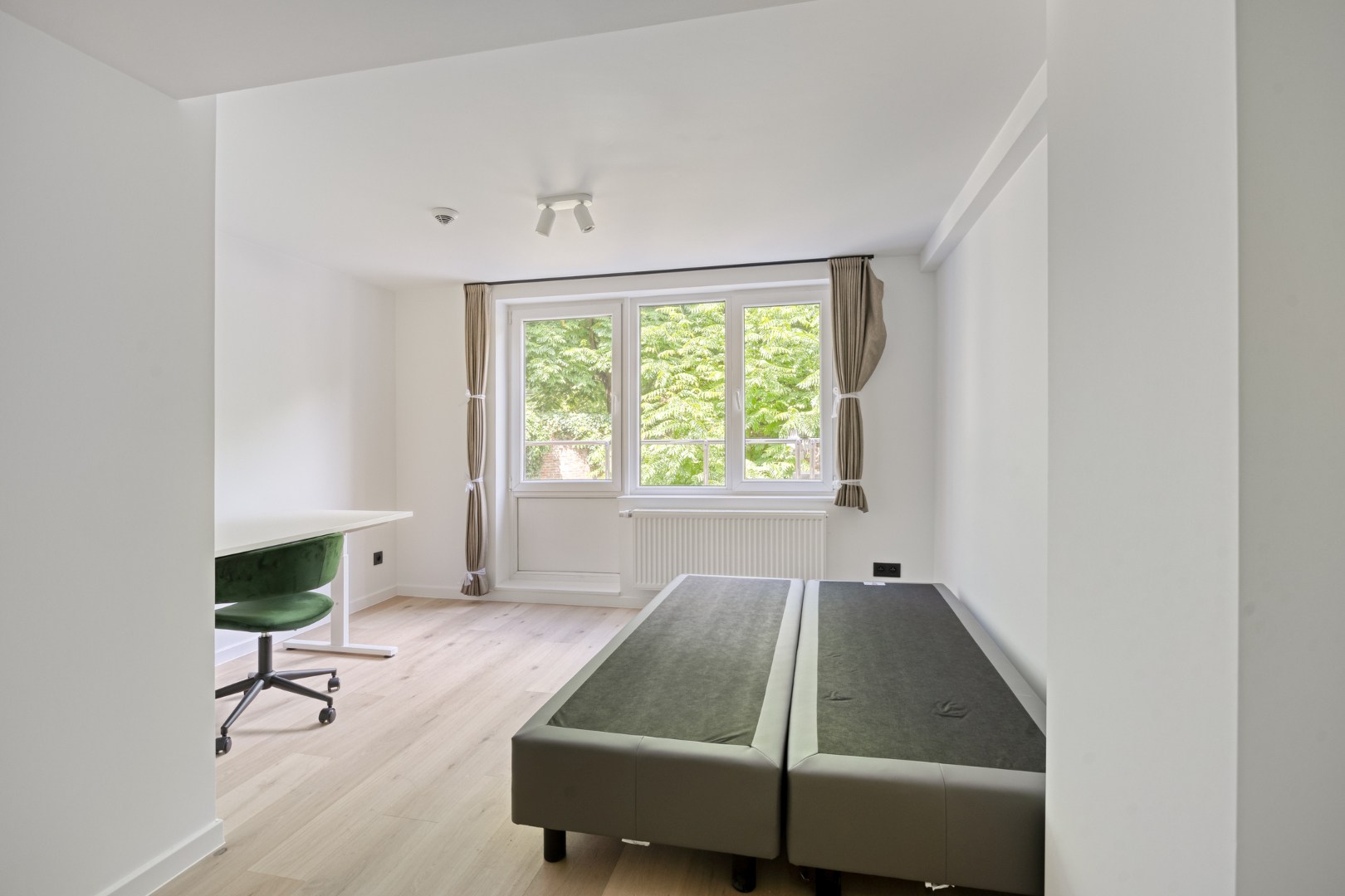 Volledig gerenoveerde studentenkamer in residentie met 15 studentenkamers en een 1slaapkamer appartement in hartje Leuven - EPC label A! 