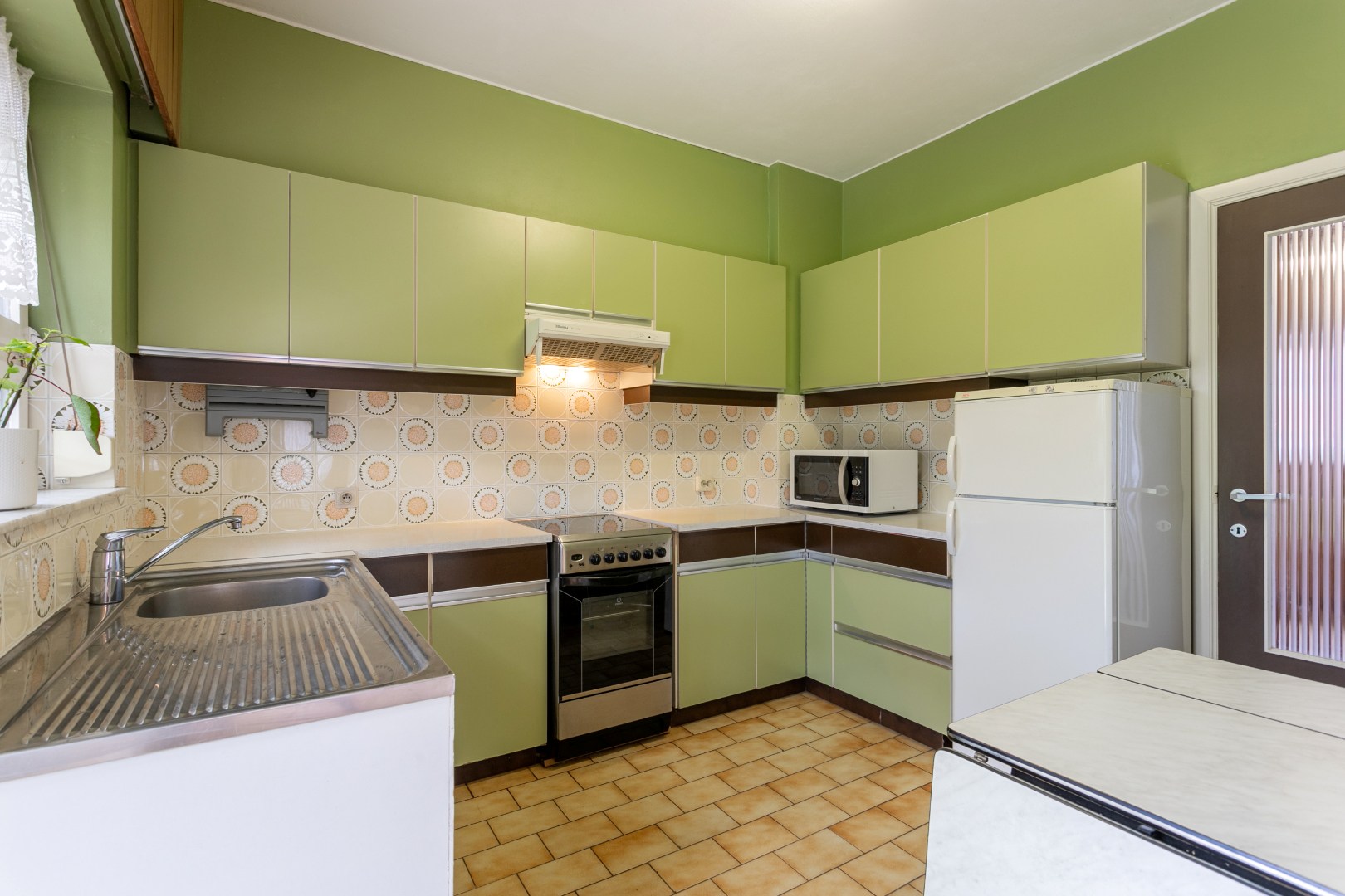 Goed gelegen 3-gevelwoning met 4 slpk 