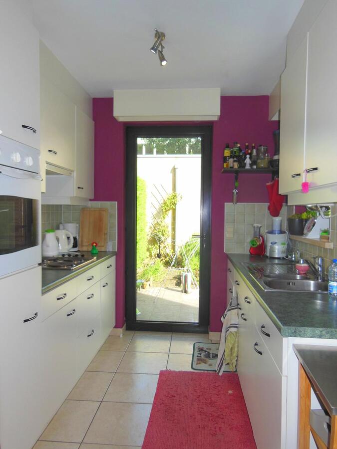 Gezellig gelijkvloersappartement met zonnige tuin en garage 