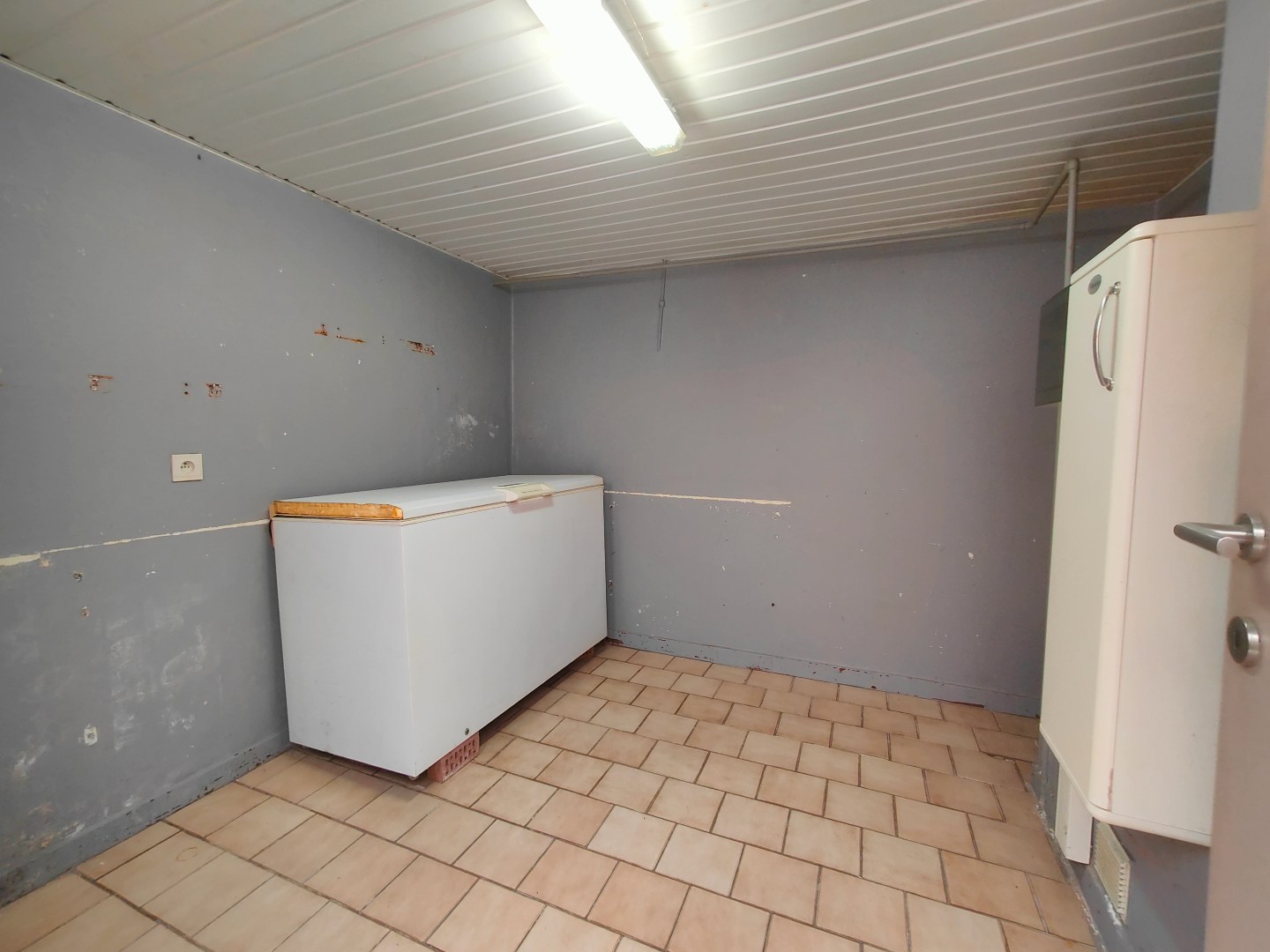 Op te frissen woning met tuin en berging op centrale ligging 