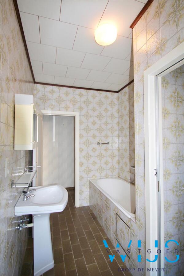 Charmante open bebouwing gelegen in gezellige wijk te Evergem! 