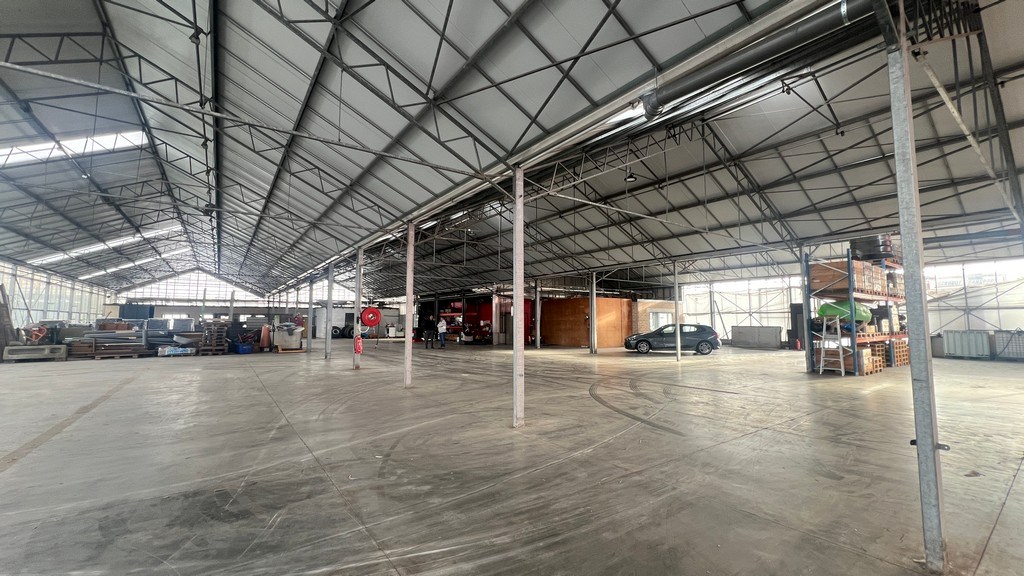 Bedrijfsgebouw te huur op zichtlocatie langs Brusselsesteenweg in Merelbeke-Melle