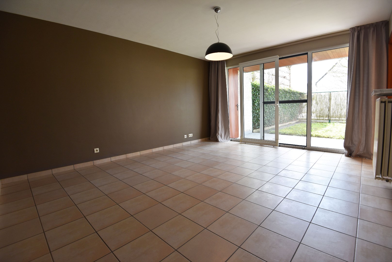 Gelijkvloers appartement met tuin en garage te Kaprijke 