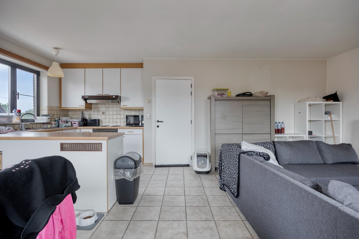 Opbrengsteigendom met 3 appartementen en 7 garages 