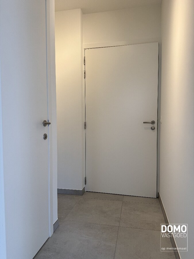 NIEUWBOUWAPPARTEMENT MET 2 SLAAPKAMERS, TERRAS, ONDERGRONDSE AUTOSTANDPLAATS EN KELDERBERGING IN RESIDENTIE "DE KWINT" TE ZONHOVEN 