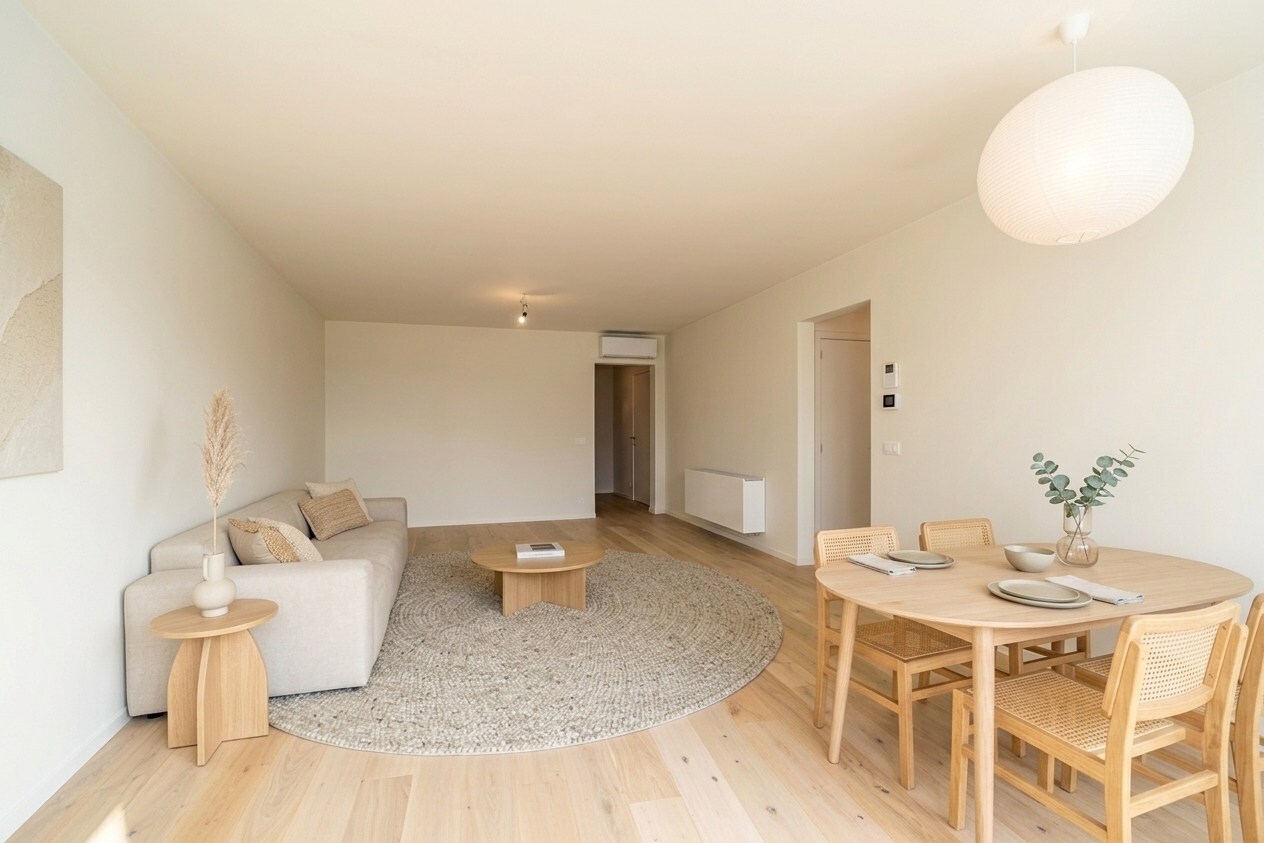 Totaal gerenoveerd appartement met open zicht en uitzonderlijke terrassen op topligging in Heist. 