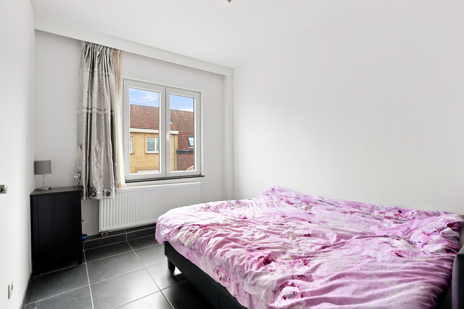 Ruime hoekwoning met 3 woonunits in het centrum van De Panne. 