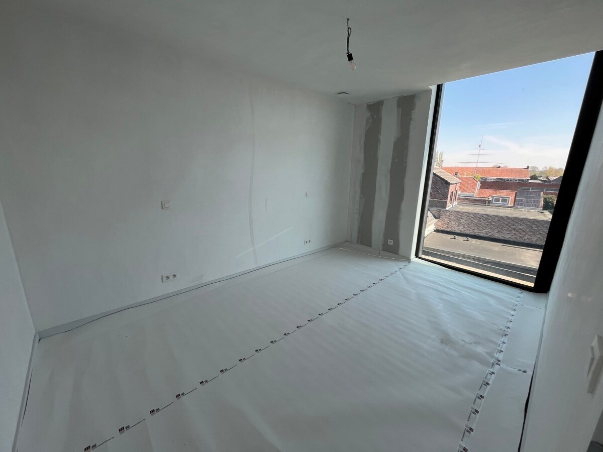 Luxe penthouse in hartje Zingem 