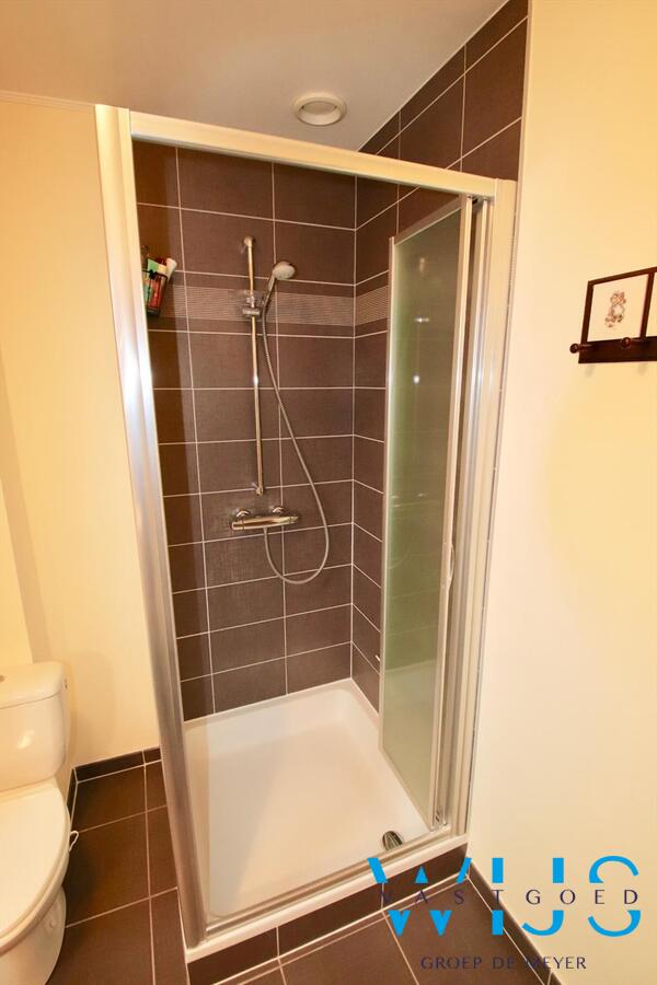 Charmant instapklaar tweeslaapkamer appartement in centrum Ertvelde! 