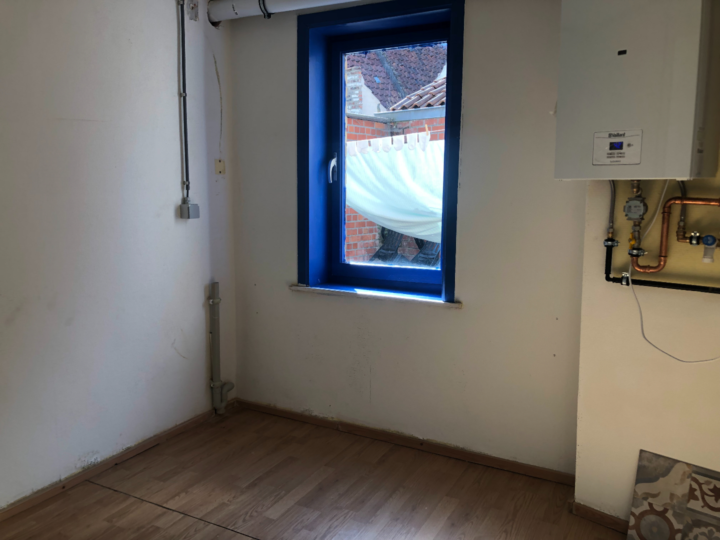 Centraal gelegen 1-slaapkamerappartement met garage 