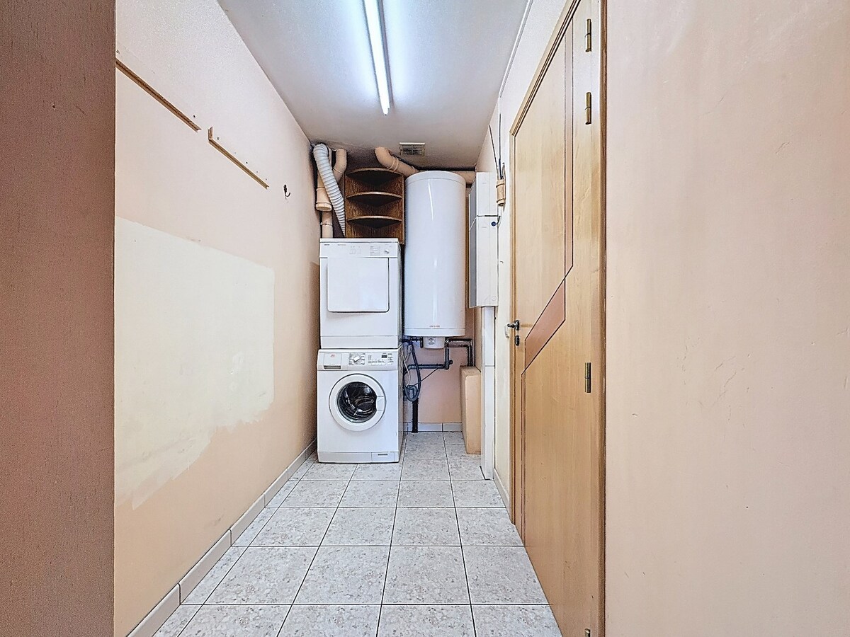 Energiezuinig gelijkvloersapp. met tuintje en garage te centrum Wetteren 