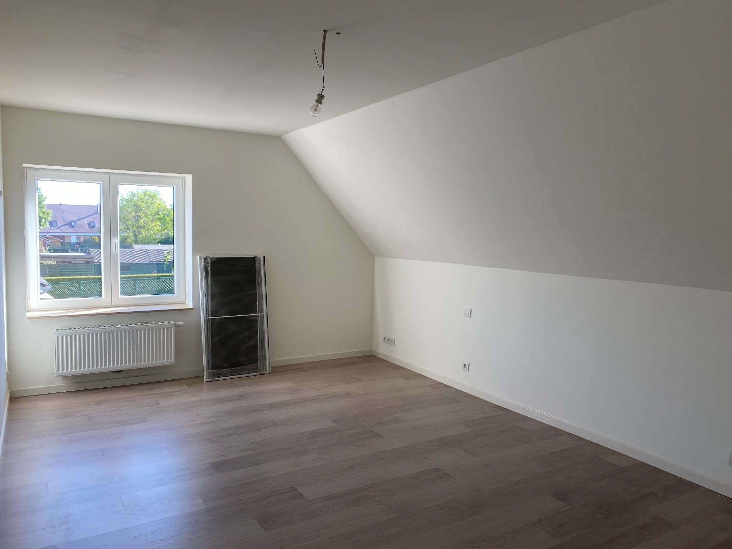 Energiezuinige halfopen woning met tuin en carport te Zulte 