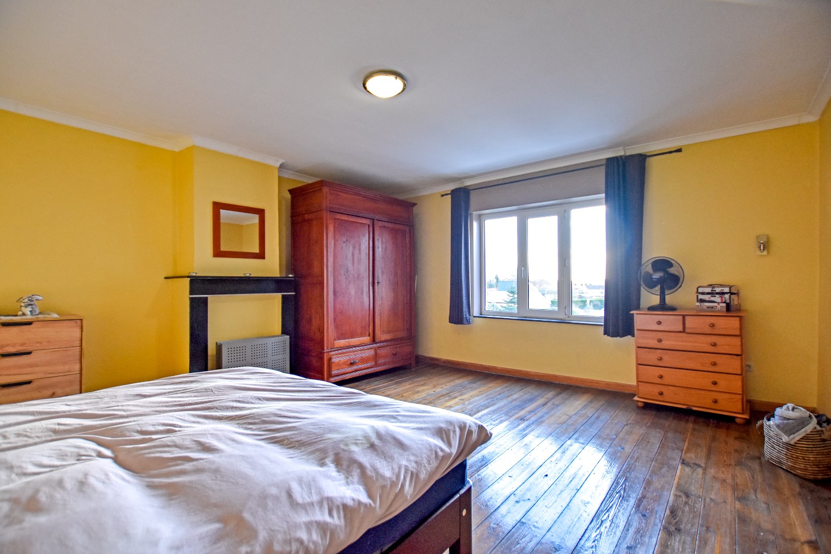 Grote woning met zongerichte tuin en 3/4 slaapkamers 