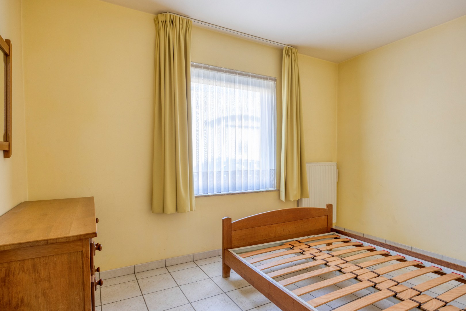 Gelijkvloers appartement met 3 slpk., ruim terras en ondergrondse garagebox in hartje Leopoldsburg 