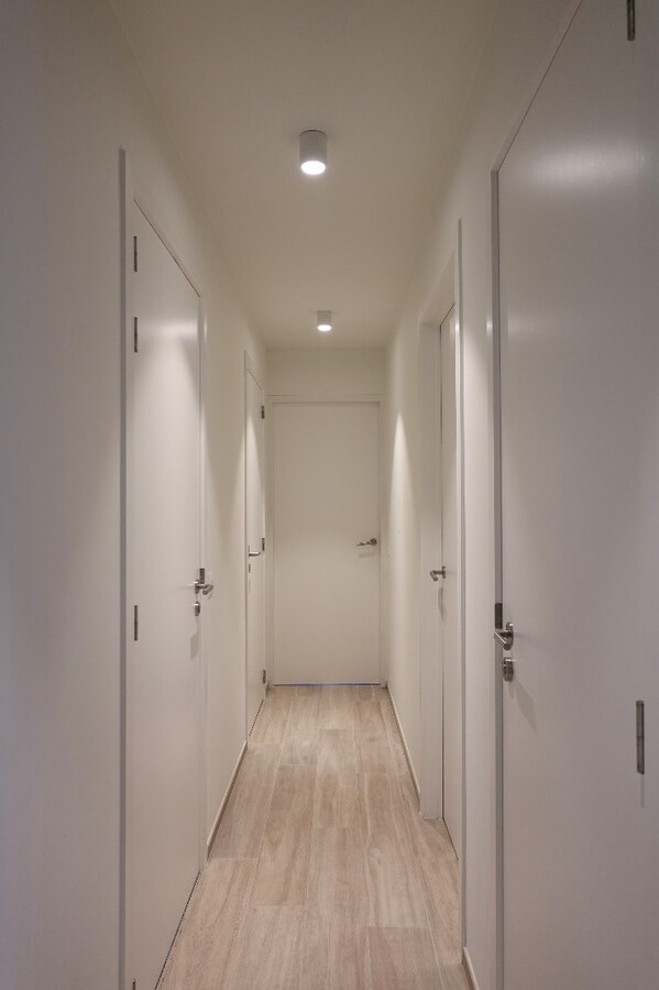 Kwalitatief nieuwbouwappartement met enorm terras en garagebox 