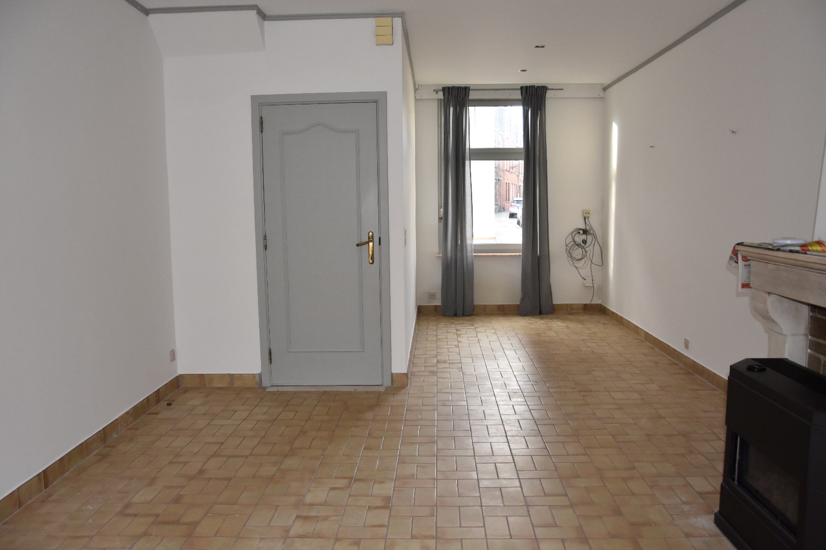 Opgefriste rijwoning met stadskoertje 