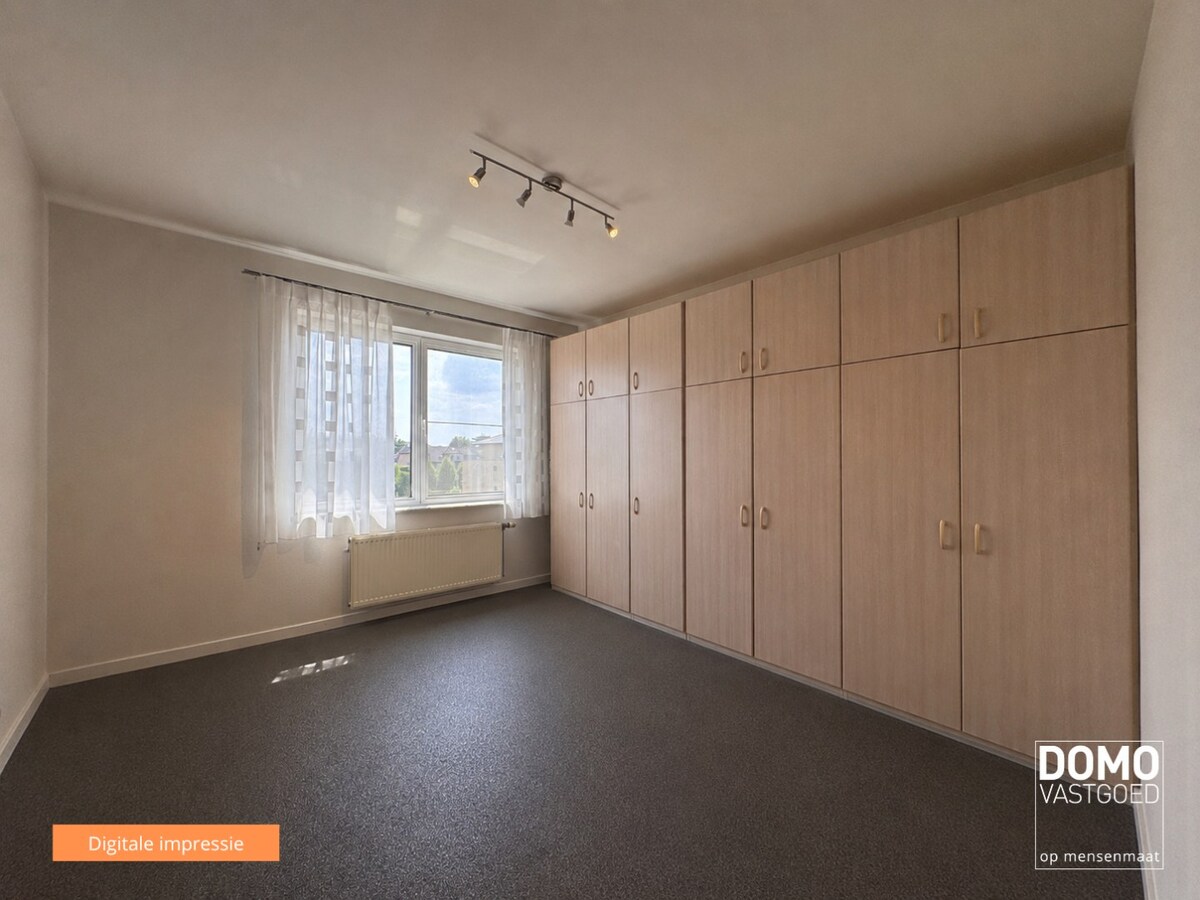 Ruim appartement van 121 m² met drie slaapkamers, twee terrassen en privatieve garagebox op toplocatie in Hasselt 