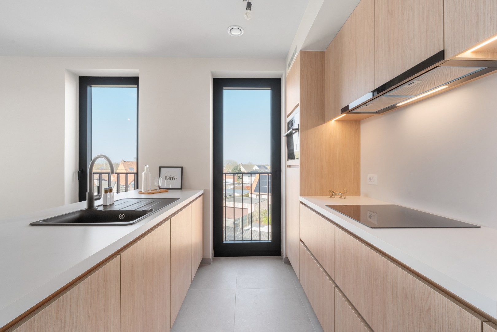 Nieuwbouwappartement met twee slaapkamers, terras en ondergrondse autostaanplaats te koop in Zulte 