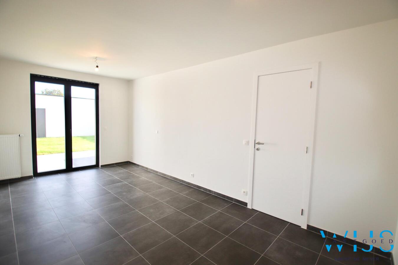 Gelijkvloers appartement met TUIN &amp; GARAGE te Zelzate! 