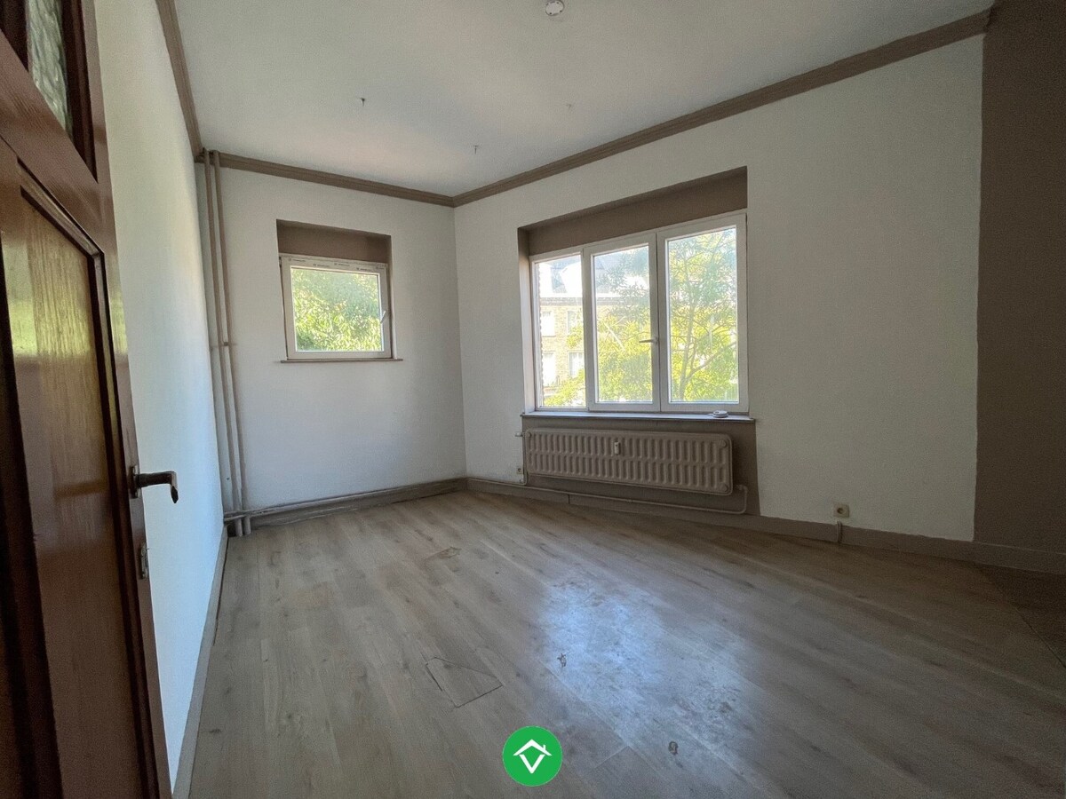 Opbrengstpand bestaande uit 3 verhuurde appartementen, gelegen aan H.Hart-Kerk 