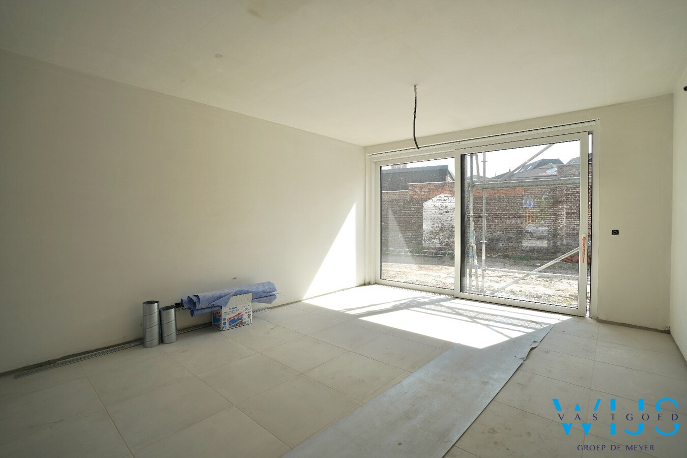 Gelijkvloers nieuwbouwappartement met private inkom en tuin 