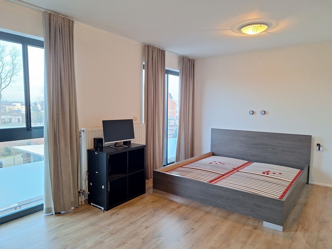 Instapklaar appartement met terras en autostandplaats in hartje Beringen 