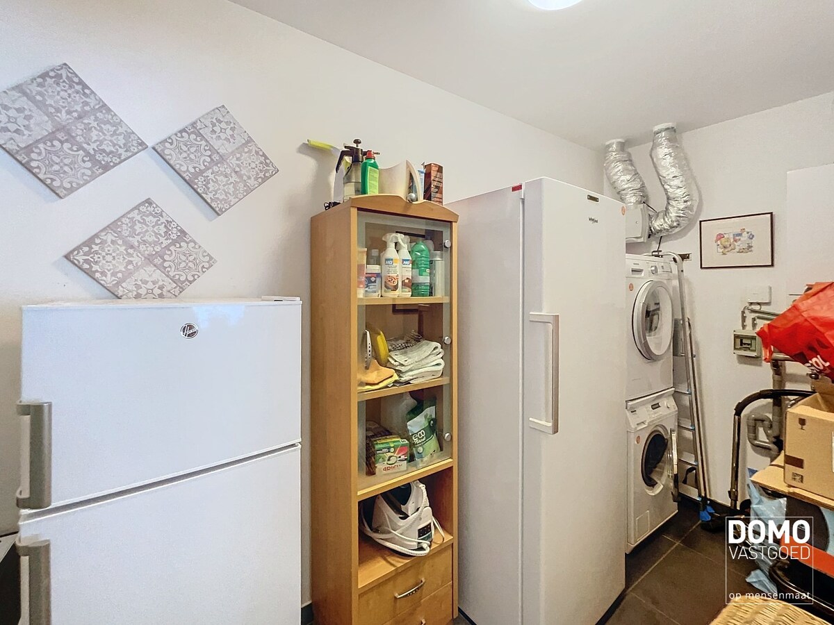 Gelijkvloers appartement met tuin en ondergrondse garage te Kermt - energielabel B -121m² bewoonbare oppervlakte 