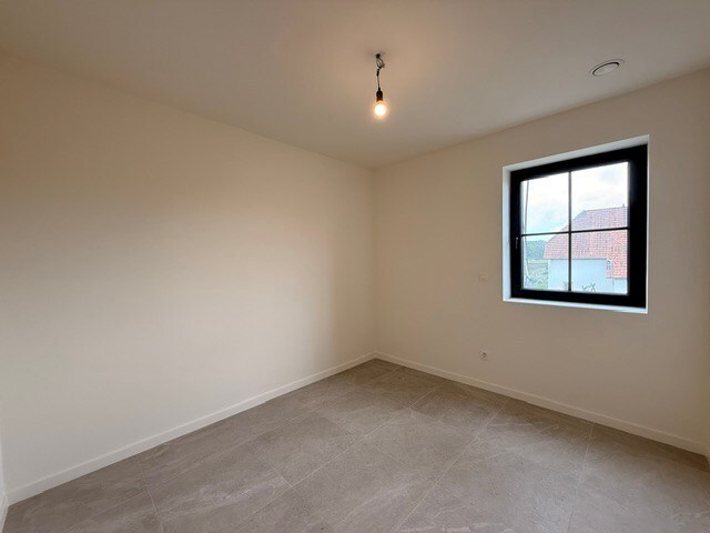 Halfopen nieuwbouwwoning met 4 slaapkamers gelegen te Opitter. 