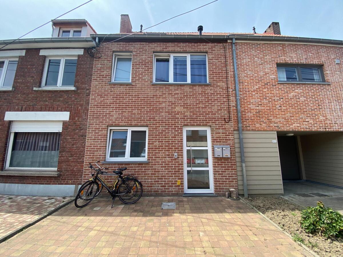 Gelijkvloersappartement met tuin en 2 autostaanplaatsen 