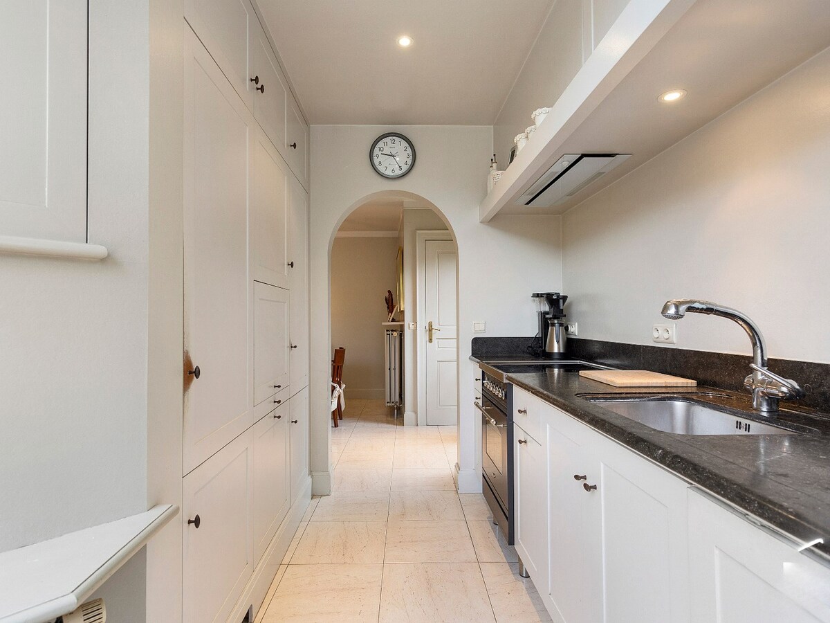 Charmant handelspand met woonst op de markt in Kruishoutem 