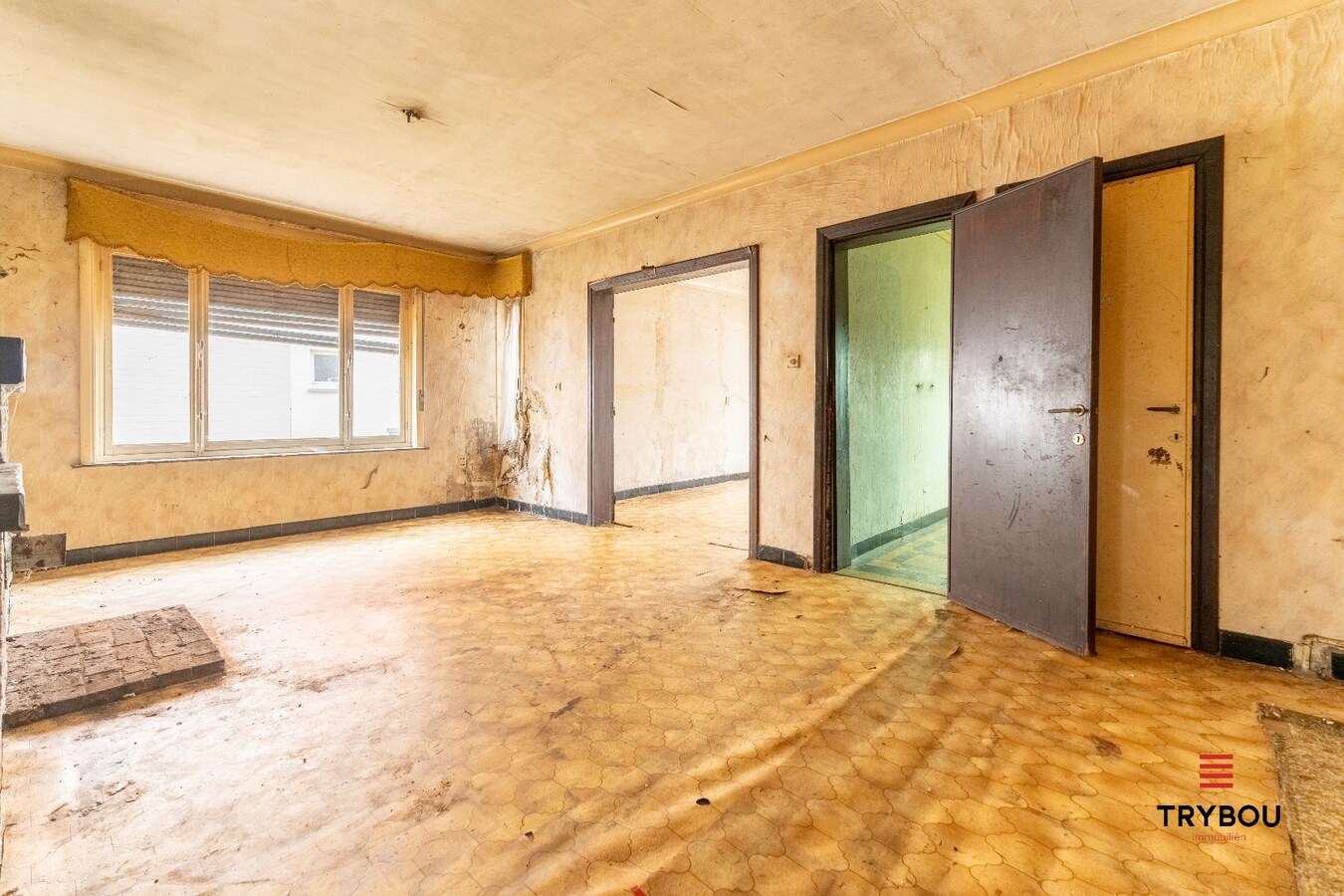 Te renoveren woning met bijgebouw en tuin in Houthulst 