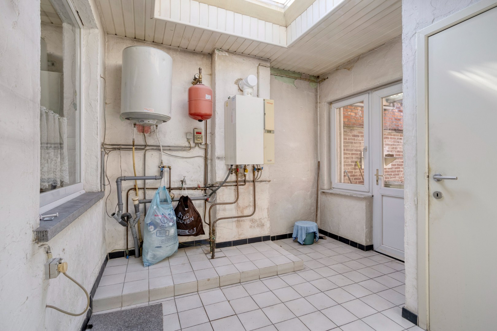 Centraal gelegen rijwoning in Kessel-Lo met parking - EPC 246 kwh/m² 