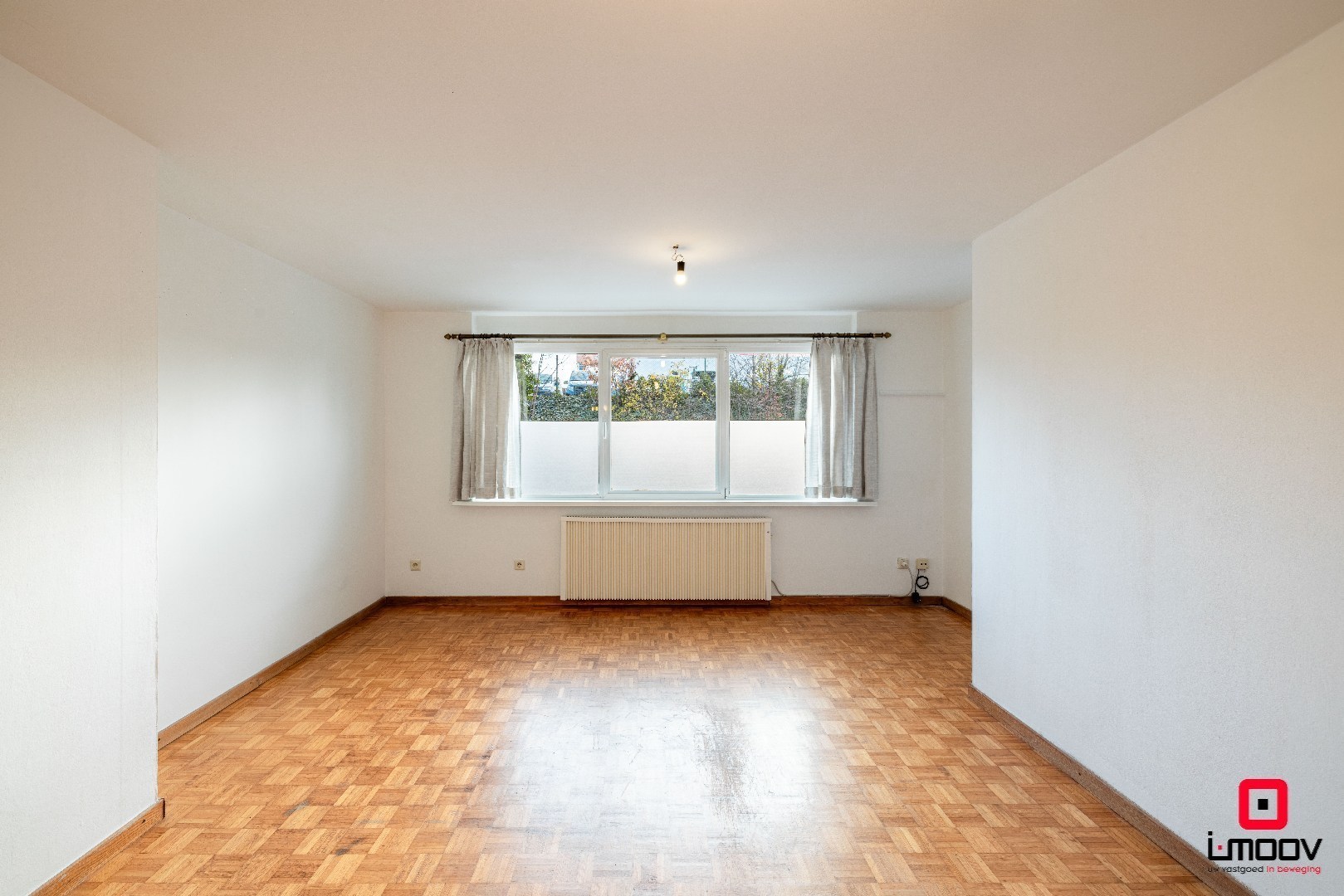 Eénslaapkamerappartement met optie voor één of twee afgesloten garageboxen op TOPLOCATIE aan Gent-Sint-Pieters 