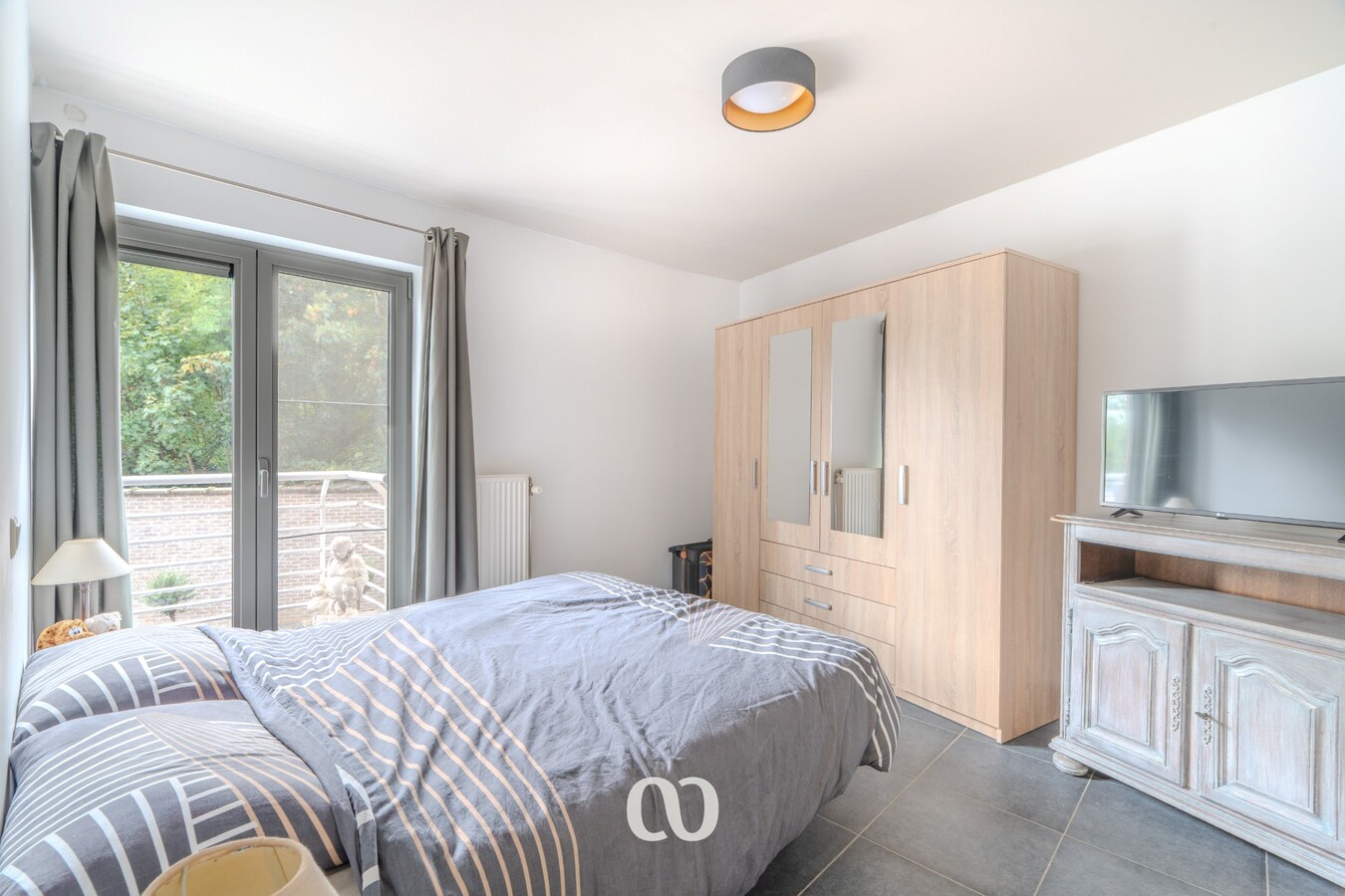 Gezellig appartement met 2 slaapkamers en garage 