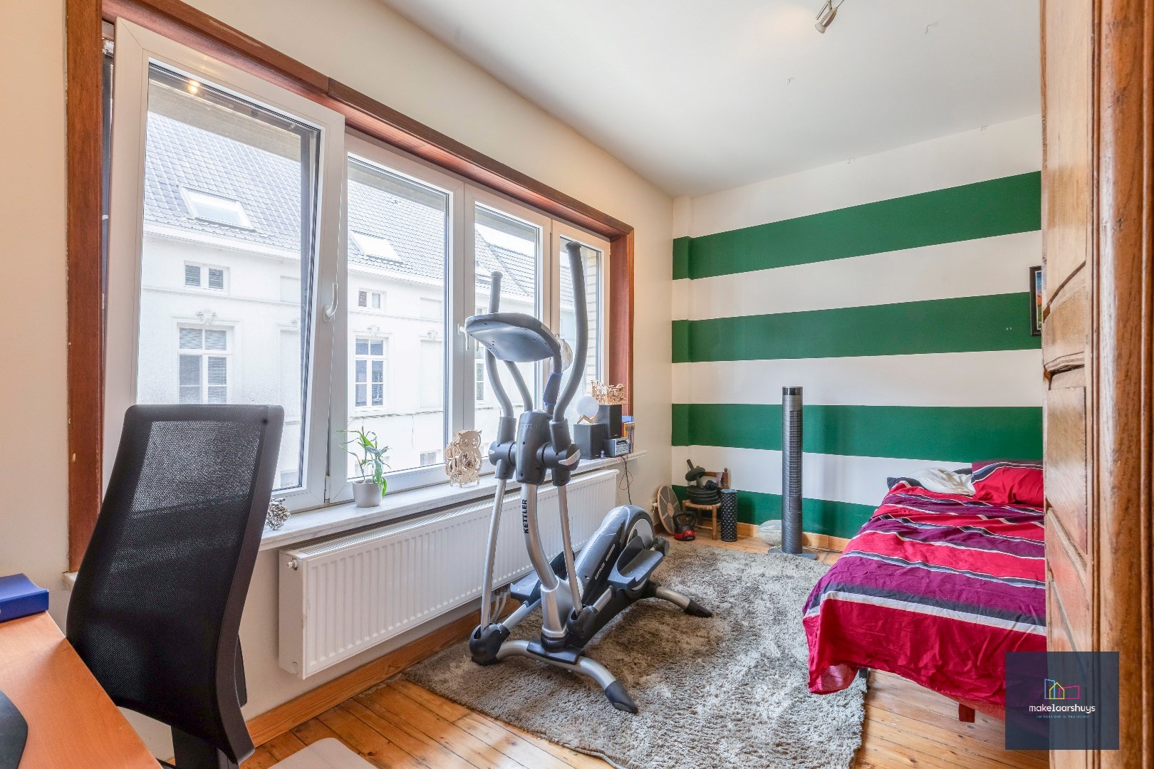 Instapklare woning met aangename tuin en garage 