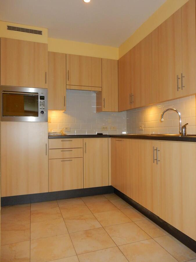 Gelijkvloers appartement met zonnige tuin 