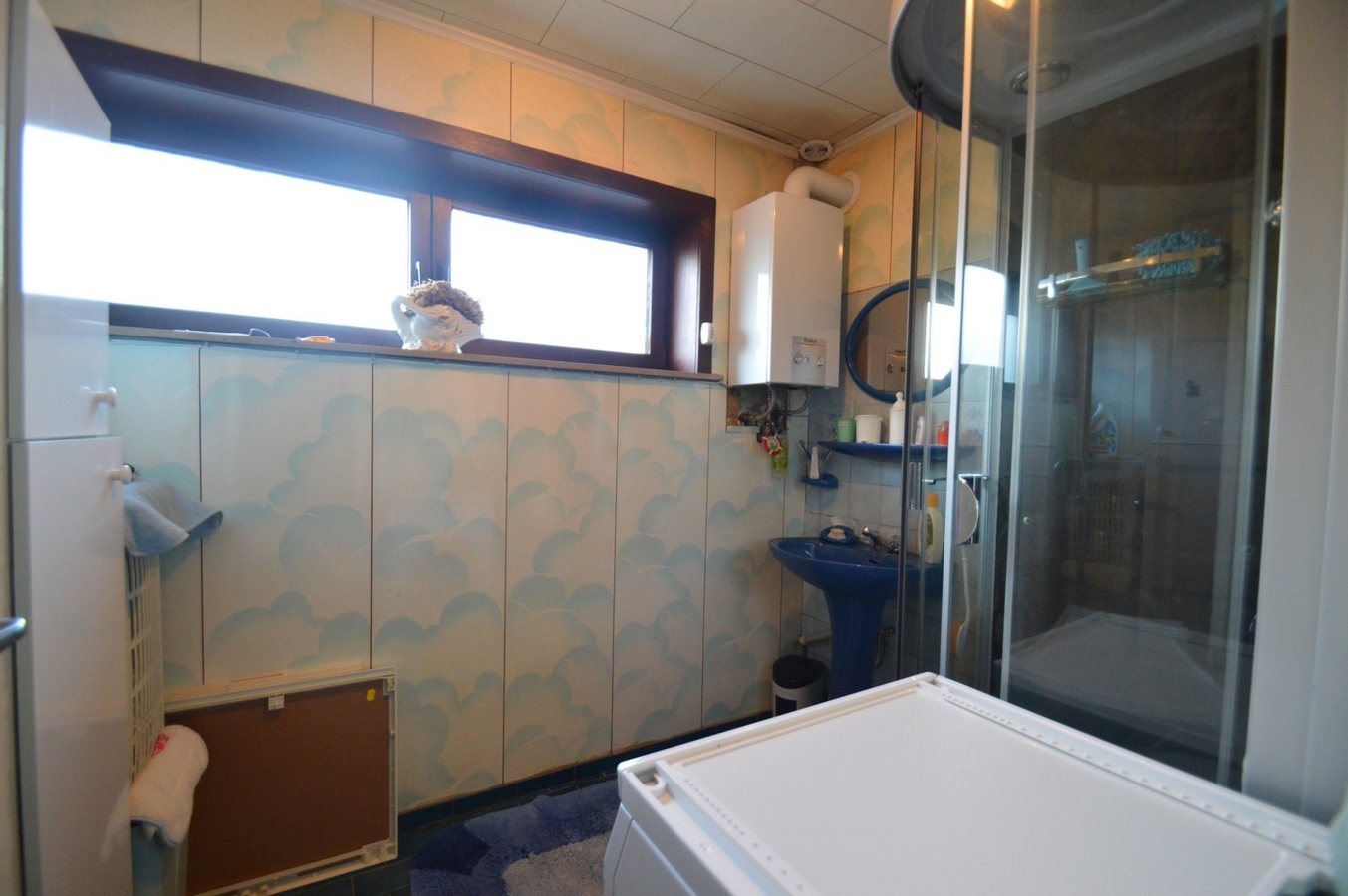 Volumineuze, te renoveren woning met garage - Heist 