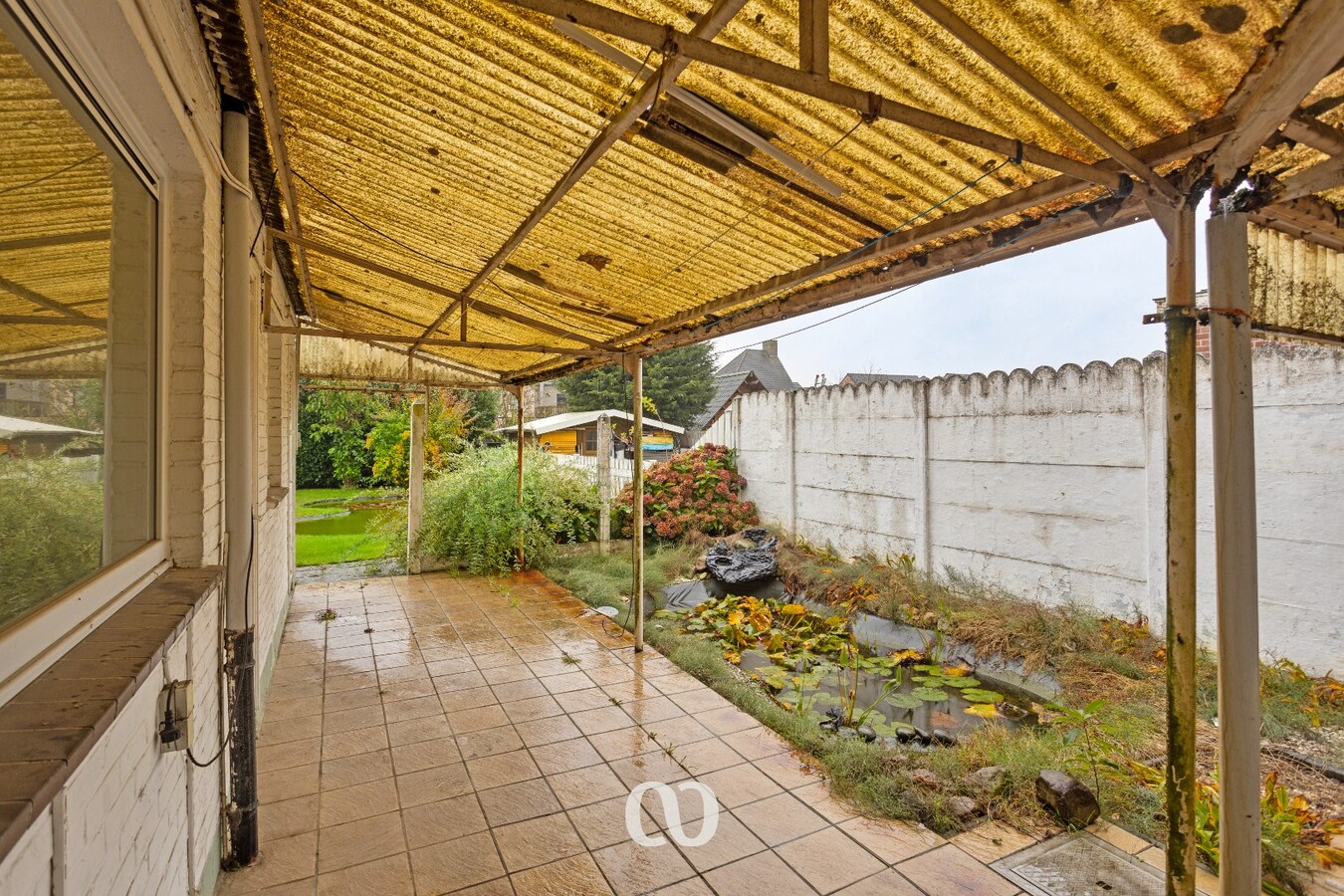 Te renoveren gezinswoning met mooie tuin in Oudenaarde 