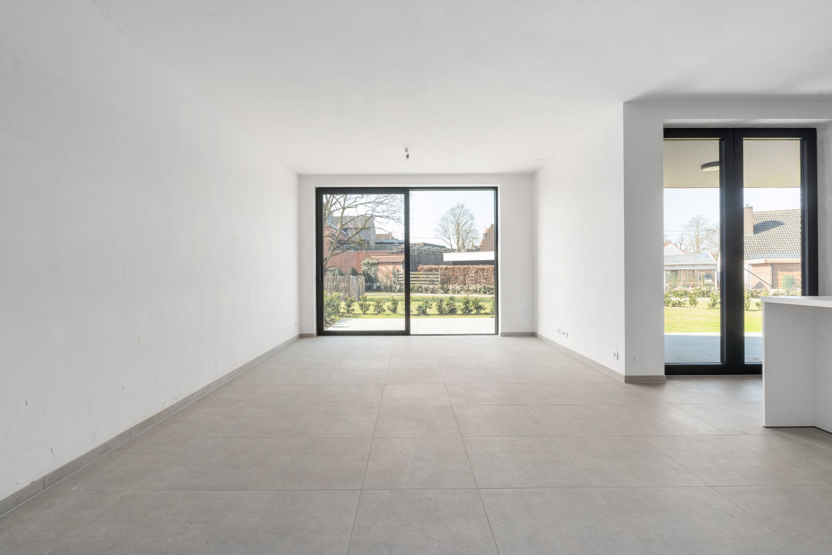 Nieuwbouwappartement met twee slaapkamers, tuin en ondergrondse autostaanplaats te koop in Zulte 